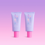 Two tubes of Naked Sundays BeautyBarrier on a pink and purple gradient background