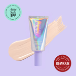 Naked Sundays Beauty sunscreen tube with a swatch on a purple background, featuring 'Acne Safe SPF' and 'Glamour Beauty & Wellness Awards 2026 Winner' badges