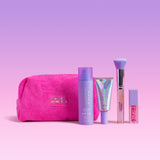 Naked Sundays pink makeup bag with SPF products on a pink background.