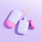 Two bottles of CabanaMilk SPF50 Mineral Barrier Fluid