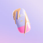 Naked Sundays CabanaMilk Mineral Priming Barrier Fluid SPF50 on a lavender background