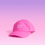 Pink cap with 'Sunday Mode' text on a pink background