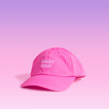 Pink cap with 'Sunday Mode' text on a pink background