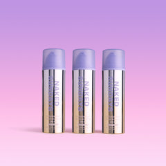 Three bottles of CabanaClear Illuminating Water Gel Serum SPF50 against a pink and purple gradient background.