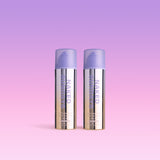 Two bottles of Naked Sundays CabanaClear Illuminating Water Gel Serum SPF50 against a pink and purple gradient background