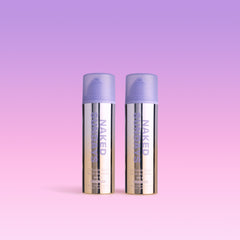 Two bottles of Naked Sundays CabanaClear Illuminating Water Gel Serum SPF50 against a pink and purple gradient background