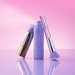 Naked Sundays SPF50 Glow Mist + CabanaClear Illuminating + SPF Brush Bundle on a pink + purple gradient background