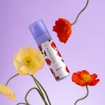 Naked Sundays x Alice & Olivia Hydrating Glow Mist limited edition bottle with flowers