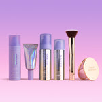 Naked Sundays products including bottles, a brush, and a compact on a pink background