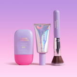 Three 'Naked Sundays' beauty products on a pink background