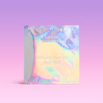 Naked Sundays Hydrating Hydrogel Sheet Mask in translucent packaging on a pink and purple holographic background.