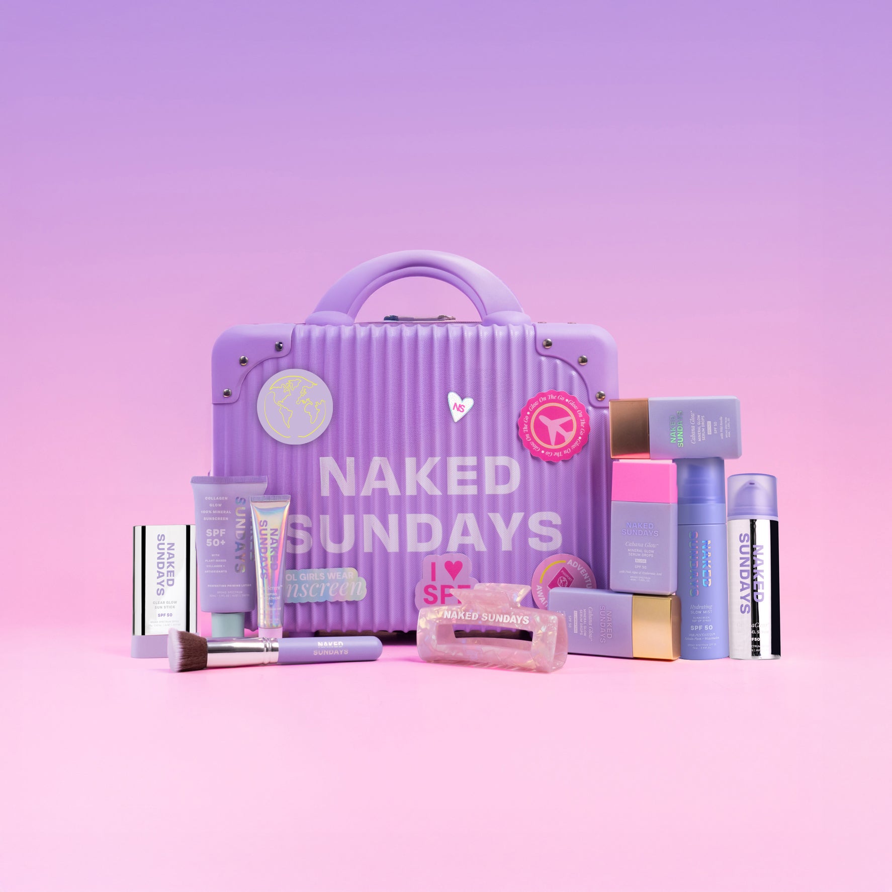 Purple suitcase labeled 'Naked Sundays' with various SPF products on a pink and purple gradient background