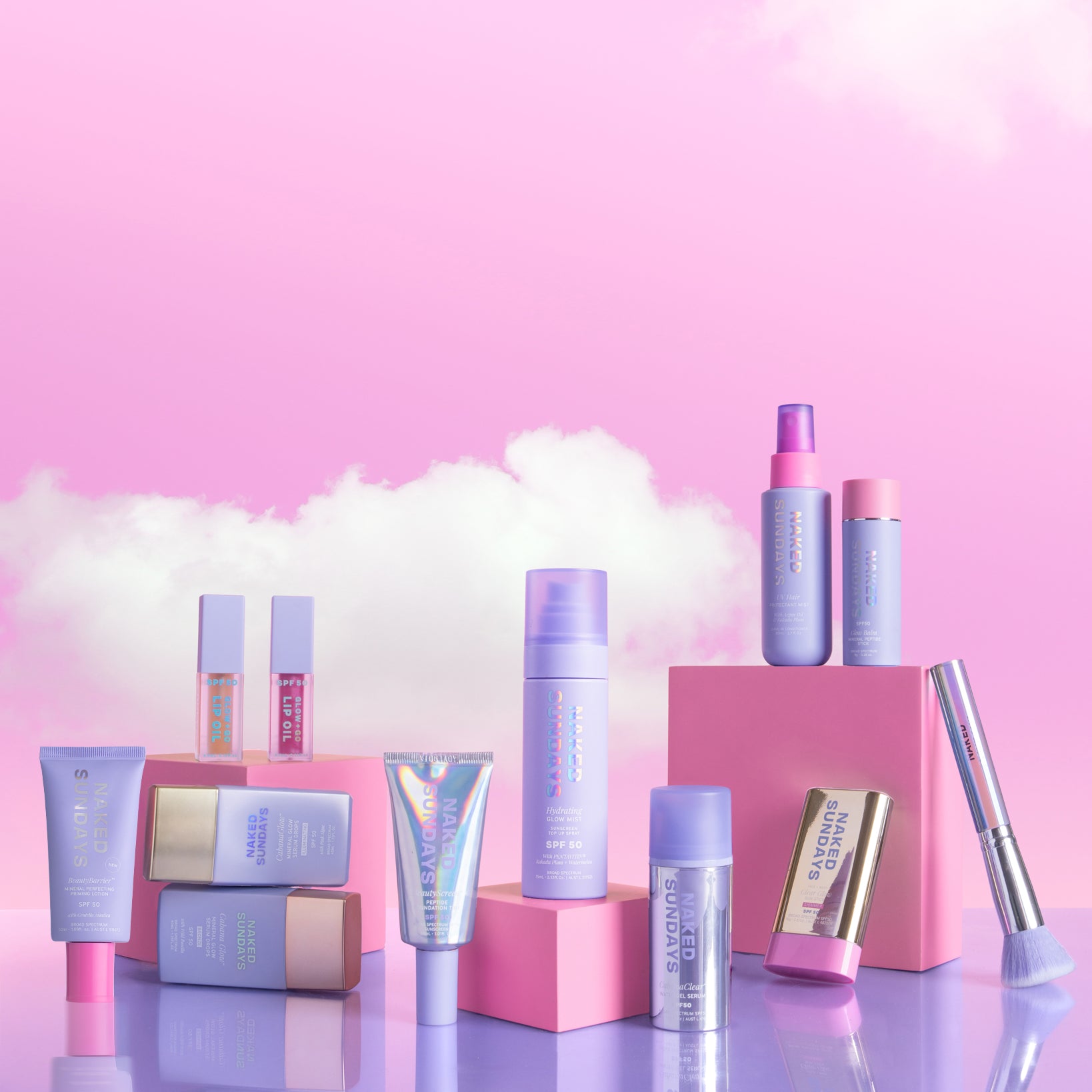 Ultimate Glow Bundle with a pink and purple color scheme on a reflective surface with a pink background
