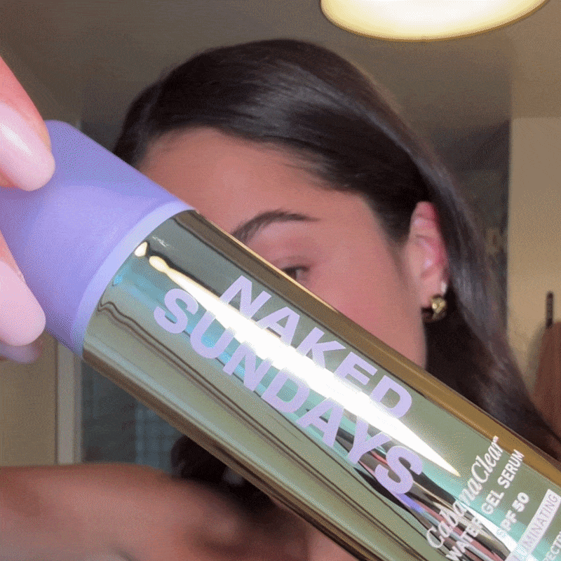 Girl applies Naked Sundays CabanaClear™ Water Gel Serum SPF50 in Illuminating to her face.