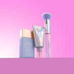 Skincare products with 'Naked Sundays' branding on a pink background