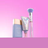Skincare products with 'Naked Sundays' branding on a pink background